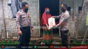 Tindak Lanjuti Arahan Kapolres Gorut, Polsek Atinggola Salurkan Bantuan Beras.