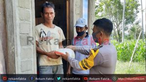 Polsek Atinggola Salurkan Bantuan Di Dua Kecamatan