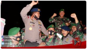 Sinergitas TNI-POLRI, Satbrimob Polda Gorontalo Datangi Markas TNI Yonif 713/Satya Tama untuk Beri Kejutan Hari jadi Ke-59