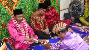 Pj Bupati Boalemo Gelar Adat Mopotilolo Sekaligus Memberikan Pembinaan Kepada Masyarakat se Kecamatan Paguyaman